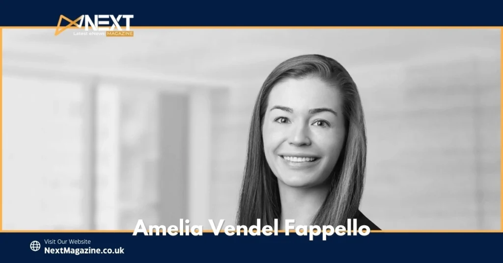 Black and white portrait of Amelia Vendel Fappello smiling, featured on NextMagazine.co.uk.