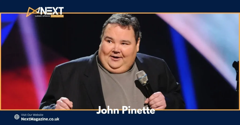 John Pinette performing stand-up comedy on stage, holding a microphone with a smile.