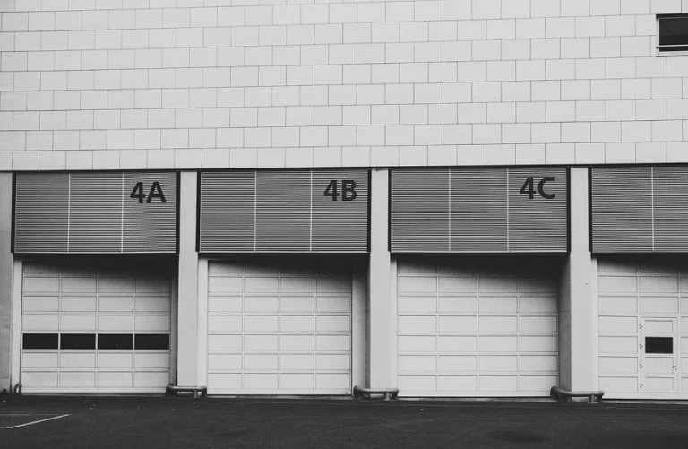 External view of numbered storage units, ideal for businesses choosing the right storage facility for their needs.