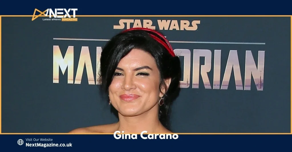 Gina Carano at a promotional event for The Mandalorian with the Star Wars logo in the background.