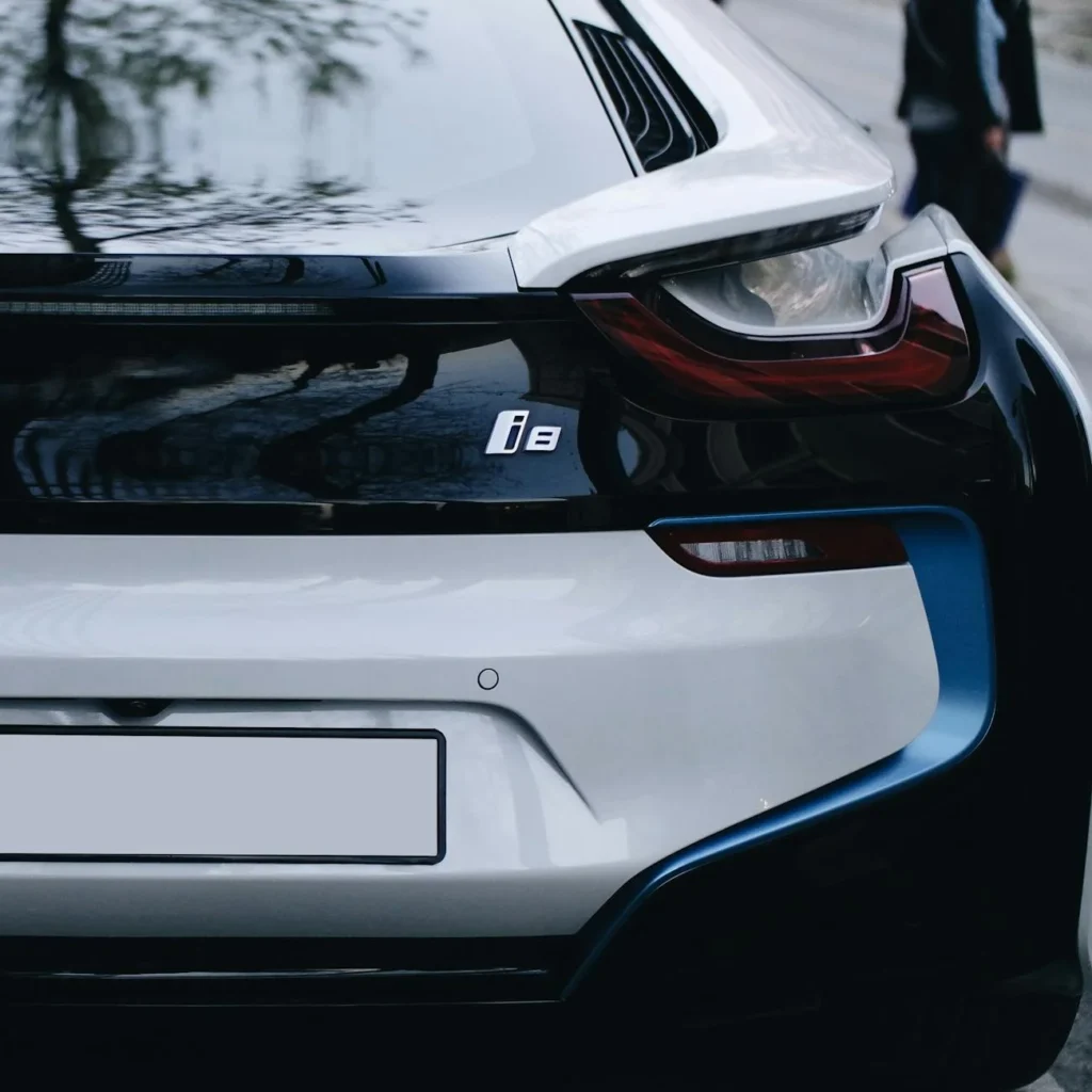 Car customisation with bonnet stripes and custom number plate for stylish and personal vehicle design