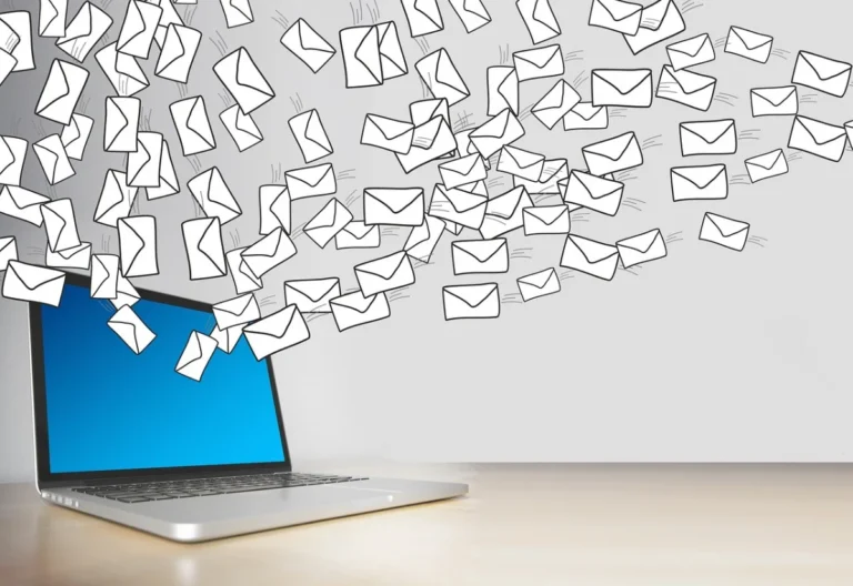 Person using a laptop to access Virtual Mailbox Services, with digital envelopes and mail icons illustrating secure online mail management.