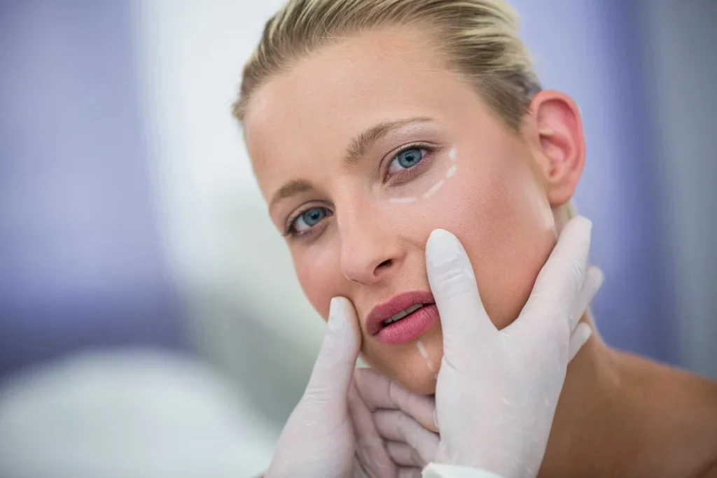 Traditional Chinese medicine and dermatology treatment with acupuncture needles on skin
