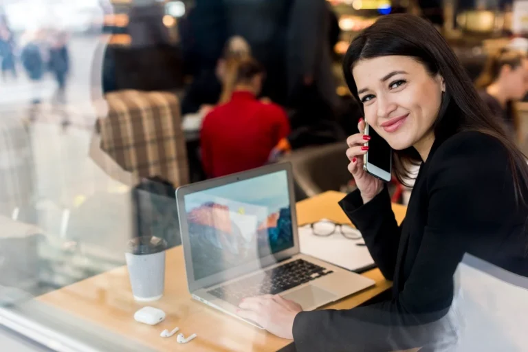 Businessperson using a phone with a virtual number in China to connect with clients
