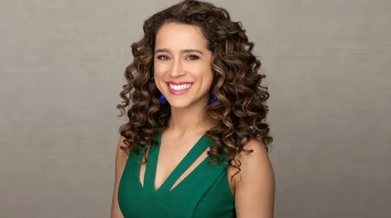 Who Is Madison Alworth? Her Age, Net Worth, Husband, and Path to Fox Business Madison Alworth standing in a modern news studio with financial market graphics and NYC skyline backdrop, holding a microphone as a Fox Business Network national correspondent