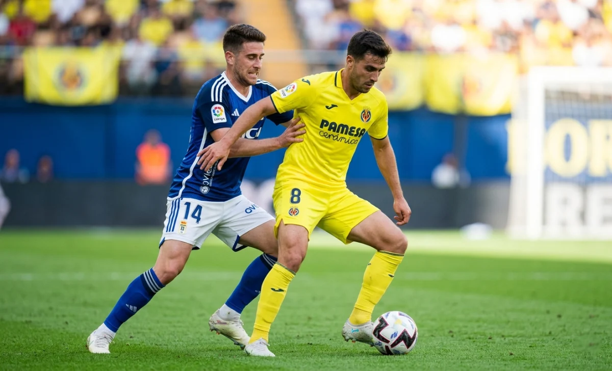 Villarreal CF vs Real Oviedo Player Ratings: Honest Match Analysis & Tactical Breakdown - Entertainment - Next Magazine Villarreal CF midfielder controlling the ball against Real Oviedo in the first half
